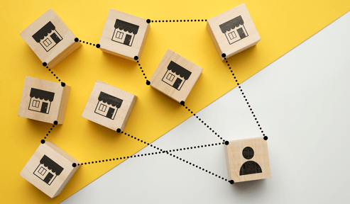 Wood squares on a table with figures on them