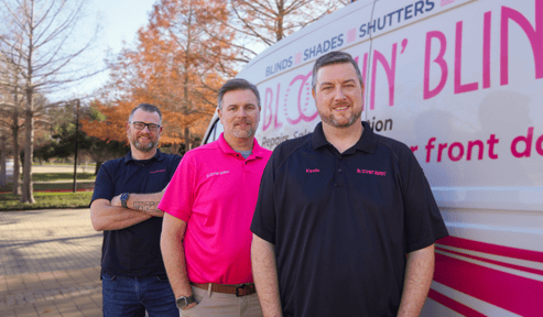 Three employees from Bloomin' Blinds with the company van next to them
