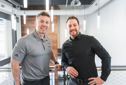 Two Franchise Sidekick advisors smiling for the camera