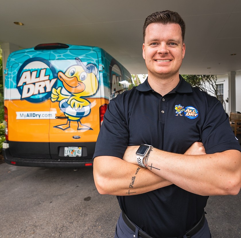 businessman standing in front of his work mobile