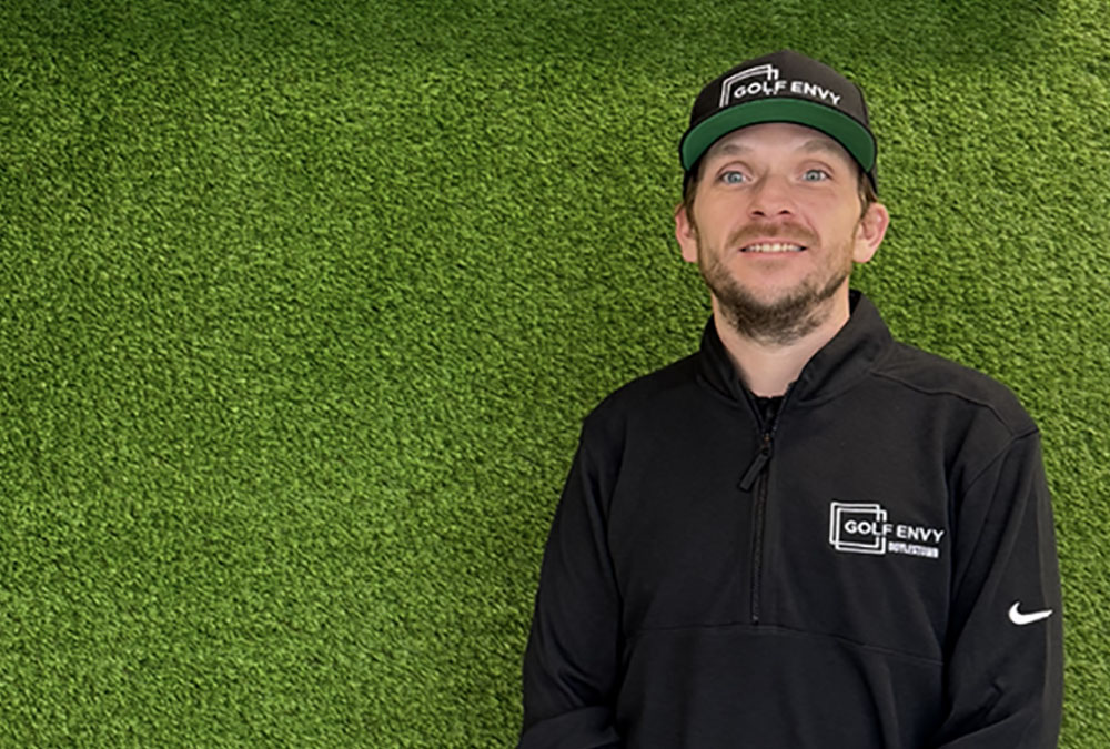 A photo of Matt George in golf envy gear